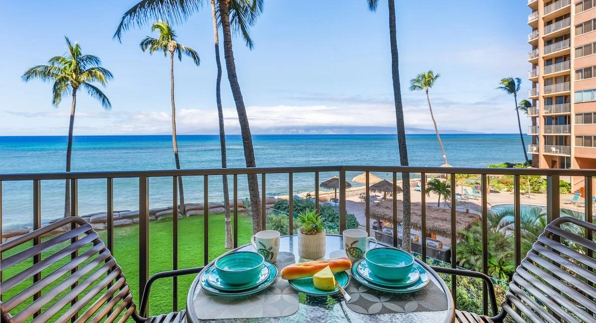 A wide scenic view of the ocean from a lanai of an ocean view vacation rental on Maui